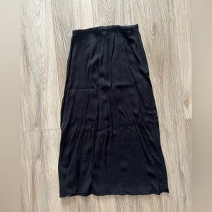 Black midi skirt with open leg